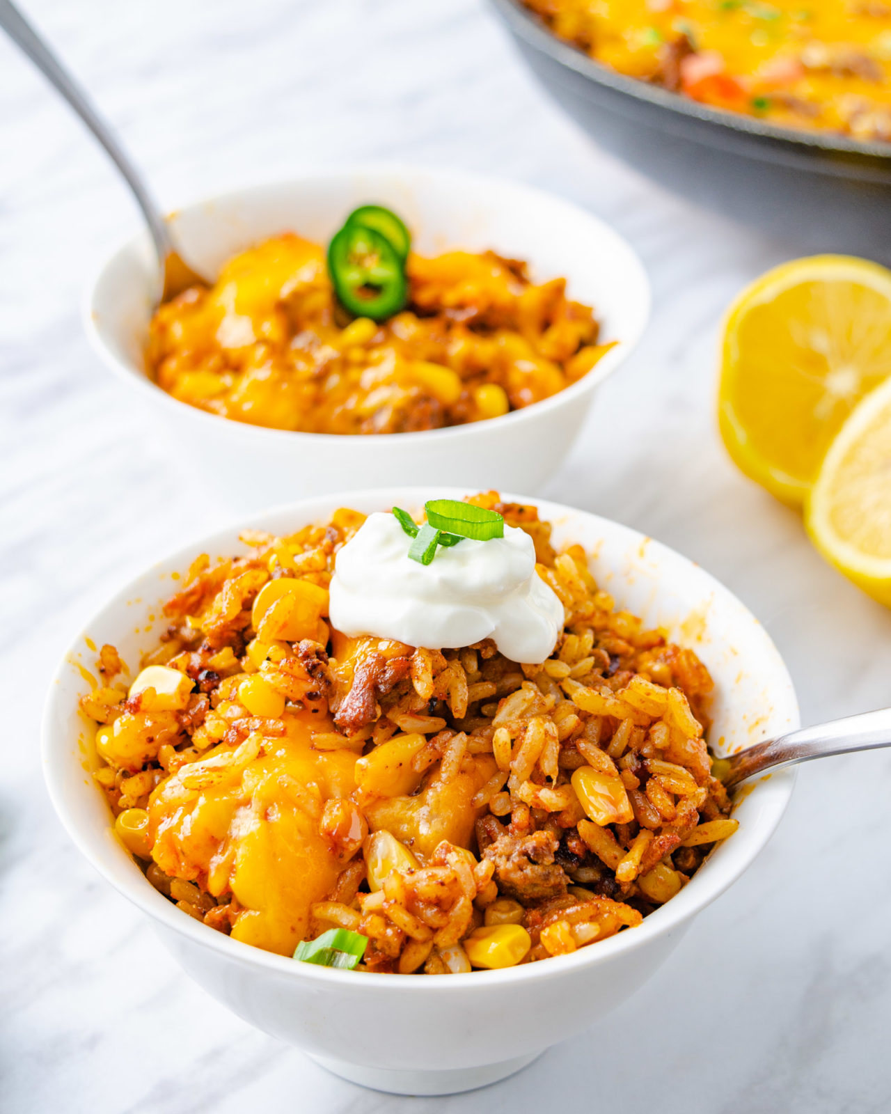 Cheesy Mexican rice in a white bowl