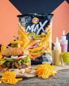 Cheeseburger chips product photography with a real cheeseburger and condiments